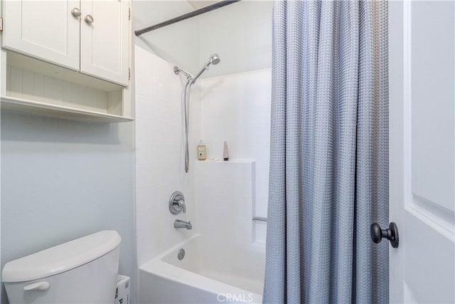 bathroom with shower / bathtub combination with curtain and toilet