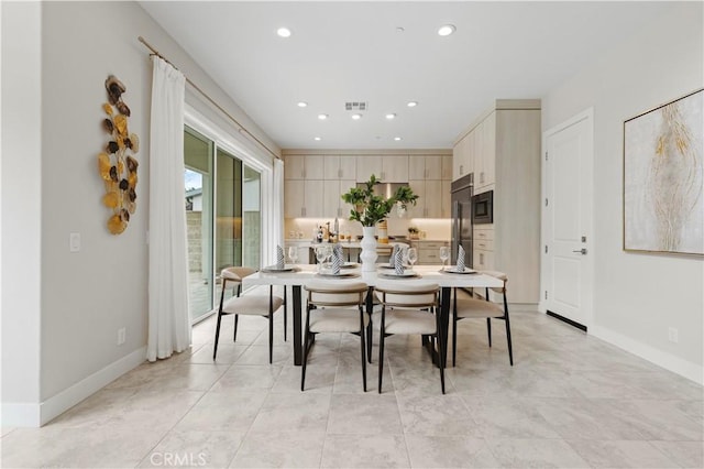 dining room with recessed lighting, visible vents, and baseboards