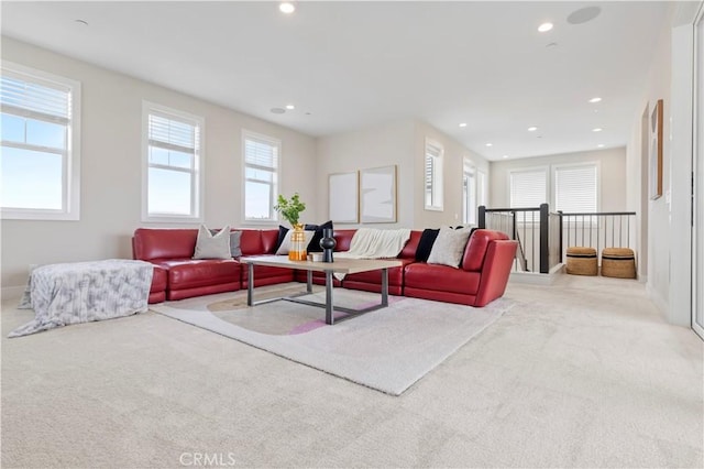 living room featuring recessed lighting and carpet