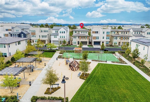 birds eye view of property with a residential view