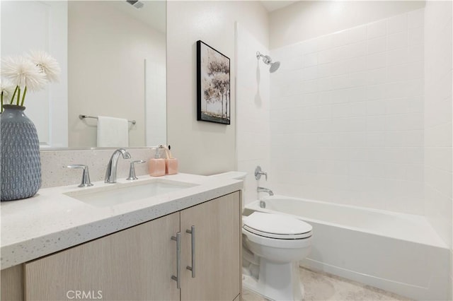 bathroom with vanity, toilet, and tub / shower combination