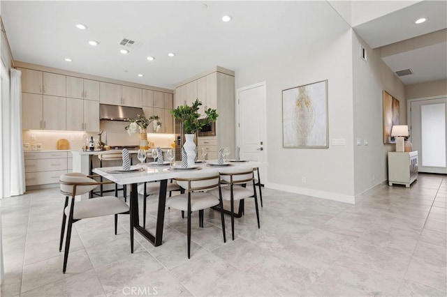 dining area with recessed lighting, visible vents, and baseboards