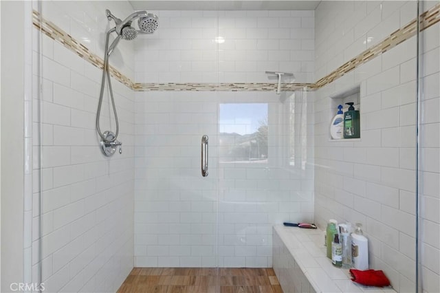 full bathroom with a shower stall