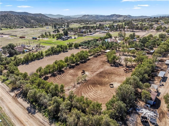 bird's eye view featuring a rural view and a mountain view