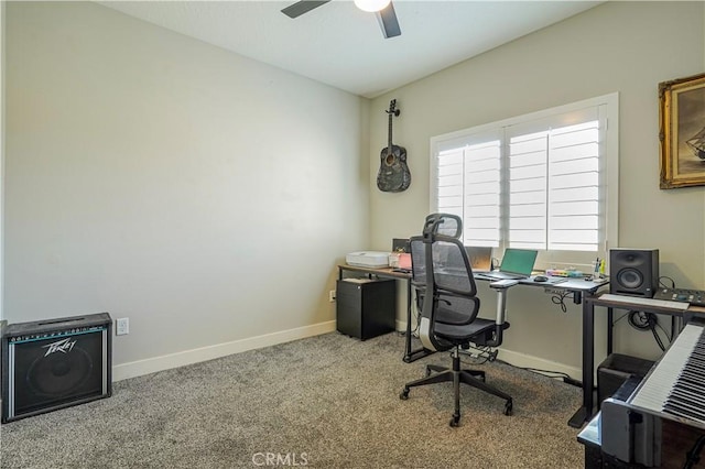 office space with carpet, baseboards, and ceiling fan