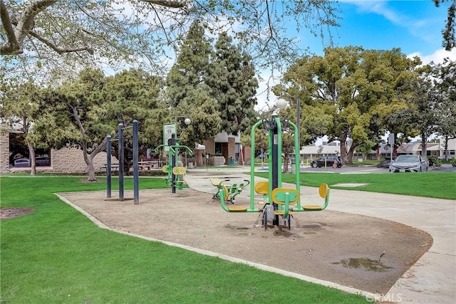 surrounding community featuring a yard and playground community