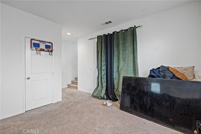 bedroom with recessed lighting, visible vents, and carpet floors