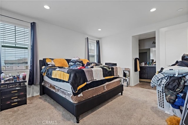 bedroom featuring recessed lighting, baseboards, and carpet floors