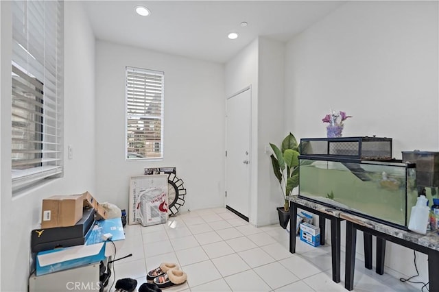 tiled entrance foyer featuring recessed lighting