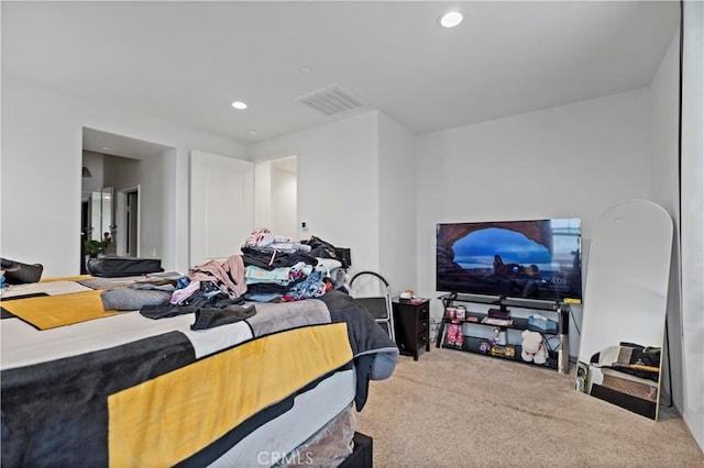 bedroom with recessed lighting, visible vents, and carpet floors