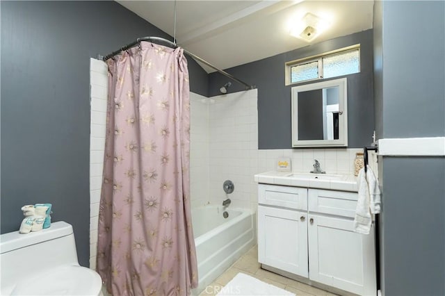 bathroom with vanity, toilet, shower / tub combo, and tile patterned flooring