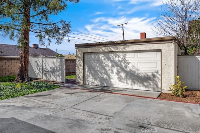 garage with fence