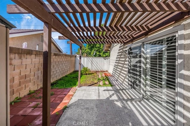 view of patio featuring a fenced backyard and a pergola