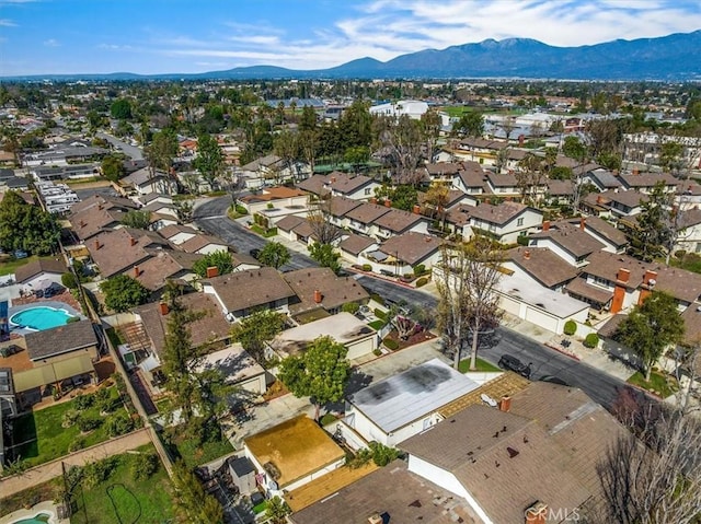 bird's eye view with a mountain view and a residential view