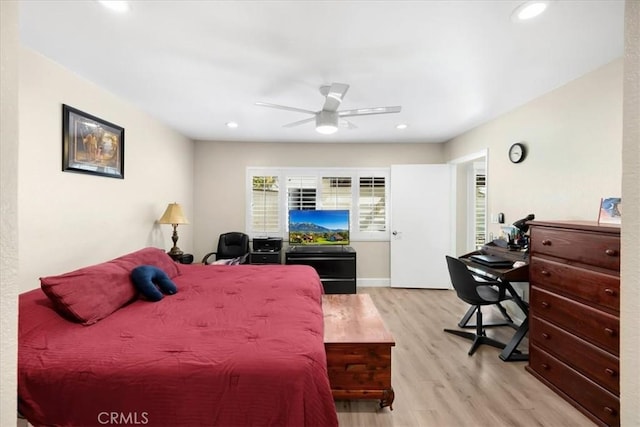 bedroom with recessed lighting, wood finished floors, and a ceiling fan