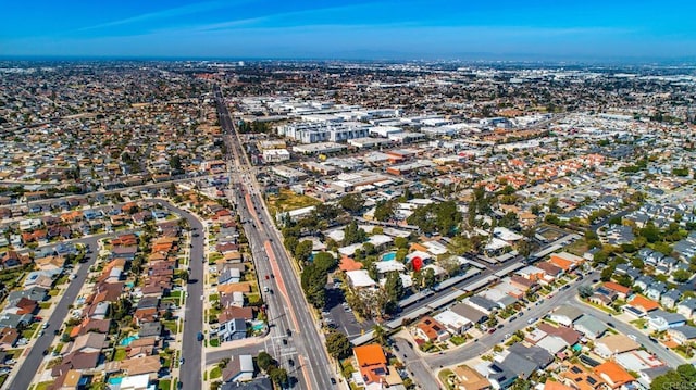 birds eye view of property with a residential view