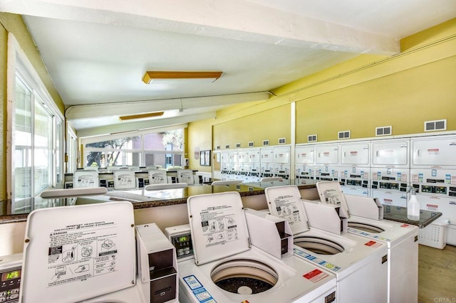 common laundry area with visible vents