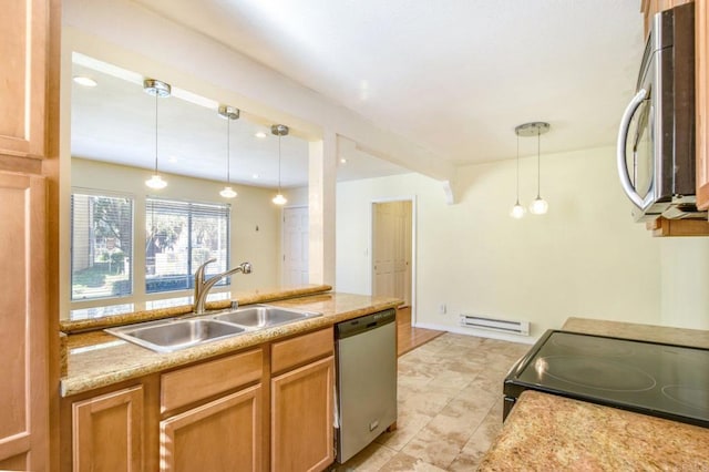 kitchen featuring a sink, stainless steel appliances, light countertops, a baseboard heating unit, and decorative light fixtures