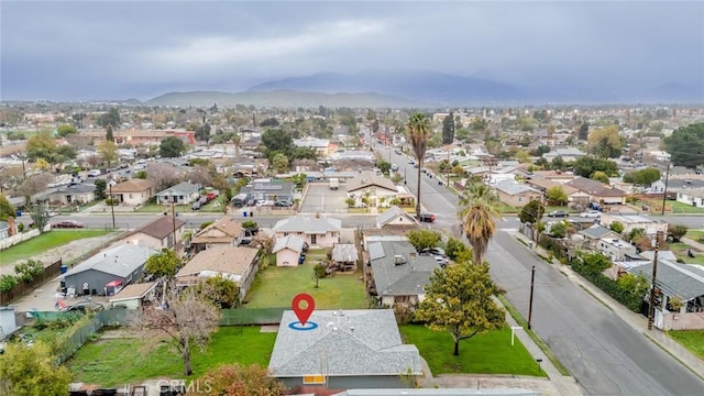 aerial view with a mountain view and a residential view