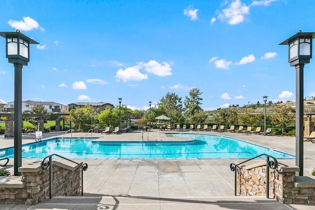 pool with a patio area