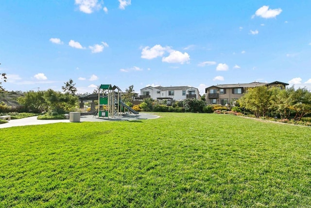 community play area featuring a yard