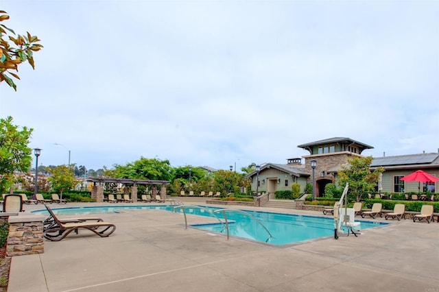 pool featuring a patio area