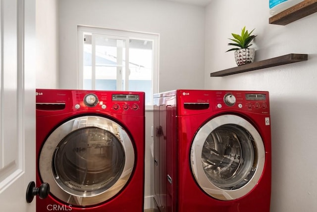 washroom featuring laundry area and washer and dryer