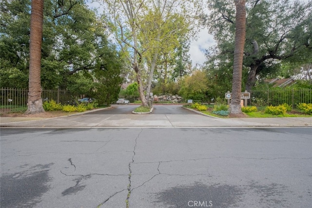 view of road featuring curbs