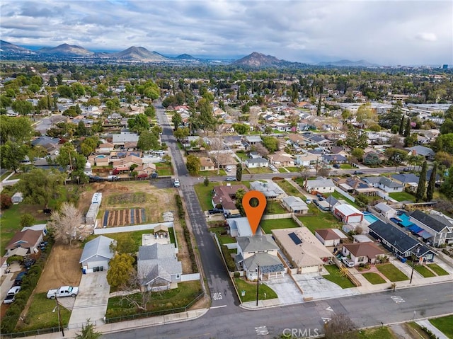 aerial view with a mountain view and a residential view