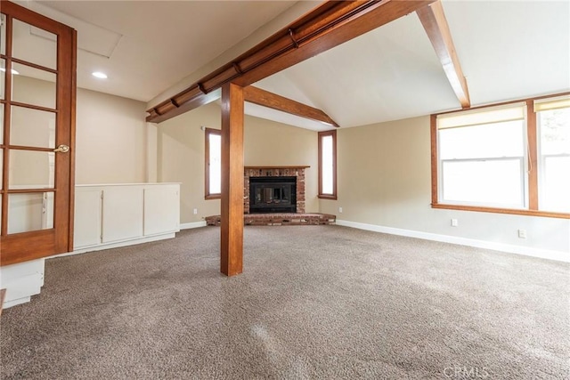 unfurnished living room featuring baseboards, lofted ceiling with beams, carpet floors, recessed lighting, and a fireplace