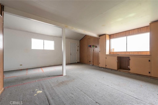 interior space featuring vaulted ceiling