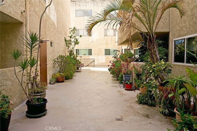 view of home's community featuring a patio area