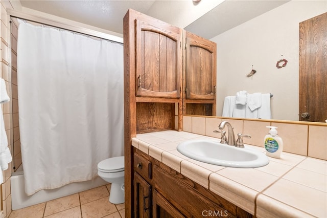 bathroom featuring vanity, tile patterned floors, toilet, and shower / bathtub combination with curtain