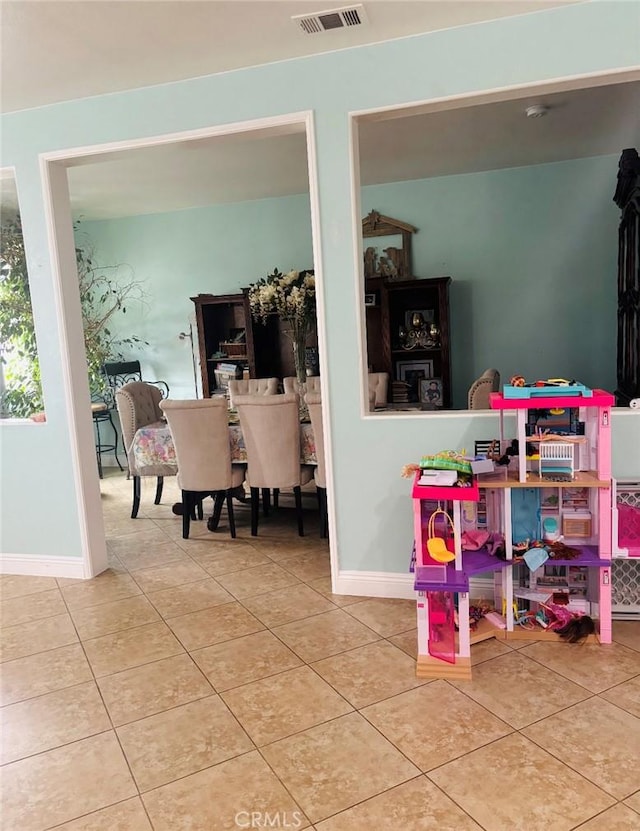 interior space featuring visible vents and baseboards