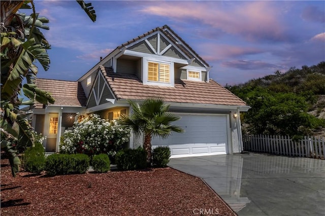 23753 Five Tribes Trl, Murrieta, CA 92562 - view of front of property with concrete driveway and an attached garage