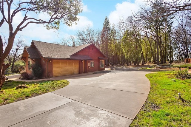 13725 Nimshew Rd, Magalia, CA 95954 - view of home's exterior featuring a garage, driveway, and a shingled roof