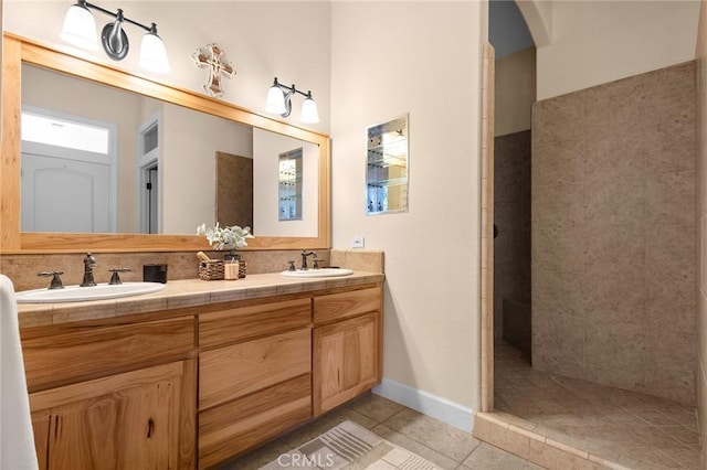 13725 Nimshew Rd, Magalia, CA 95954 - full bath featuring tile patterned flooring, a tile shower, double vanity, and a sink