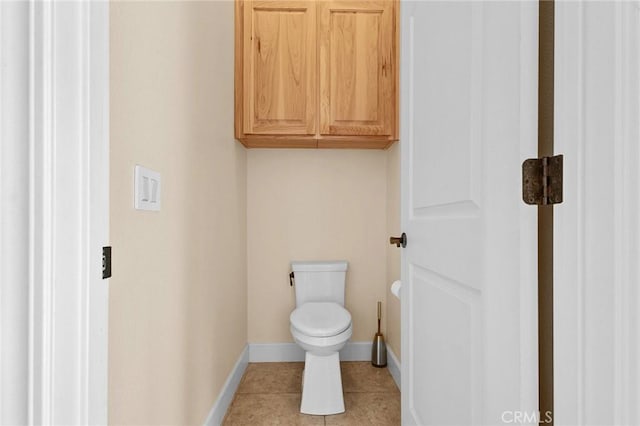 13725 Nimshew Rd, Magalia, CA 95954 - bathroom with tile patterned flooring, toilet, and baseboards