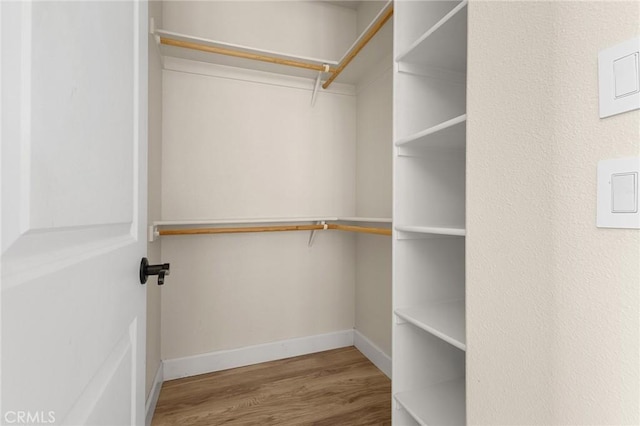 13725 Nimshew Rd, Magalia, CA 95954 - walk in closet with wood finished floors