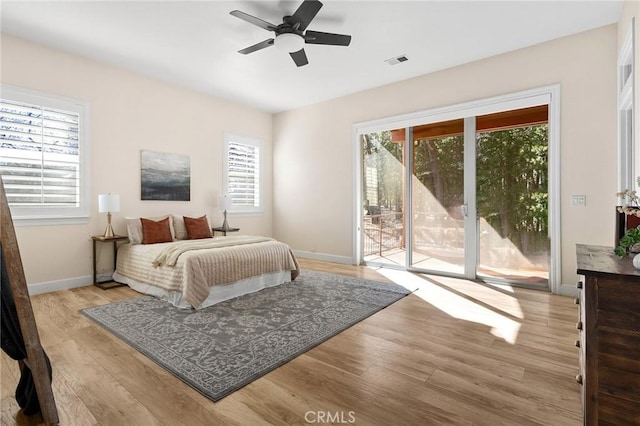 13725 Nimshew Rd, Magalia, CA 95954 - bedroom featuring light wood finished floors, visible vents, baseboards, and access to outside