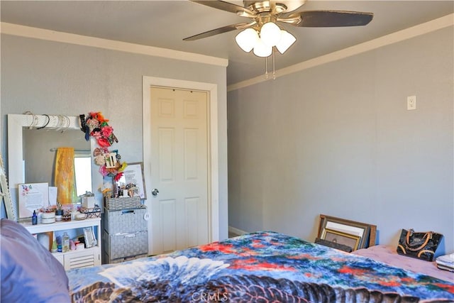 bedroom featuring crown molding and ceiling fan
