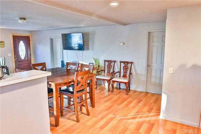 dining room with recessed lighting, light wood-style floors, and baseboards
