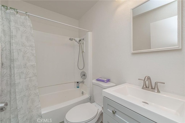 full bathroom featuring vanity, toilet, and shower / tub combo