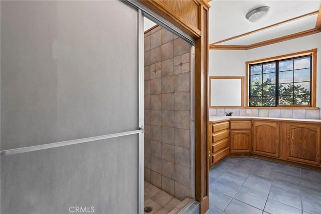 bathroom featuring tile patterned floors and a stall shower