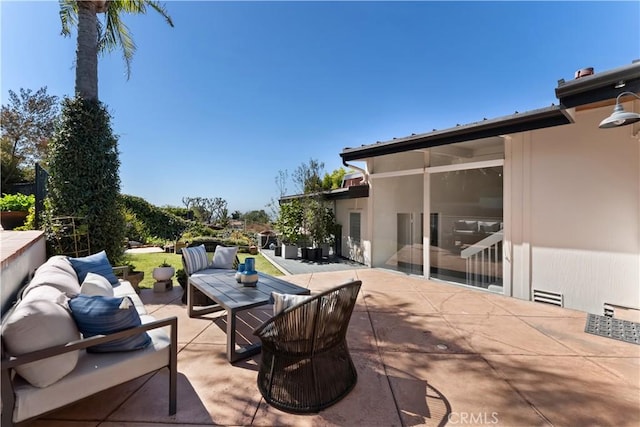 view of patio featuring an outdoor living space