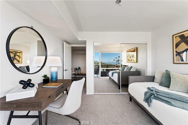bedroom featuring carpet