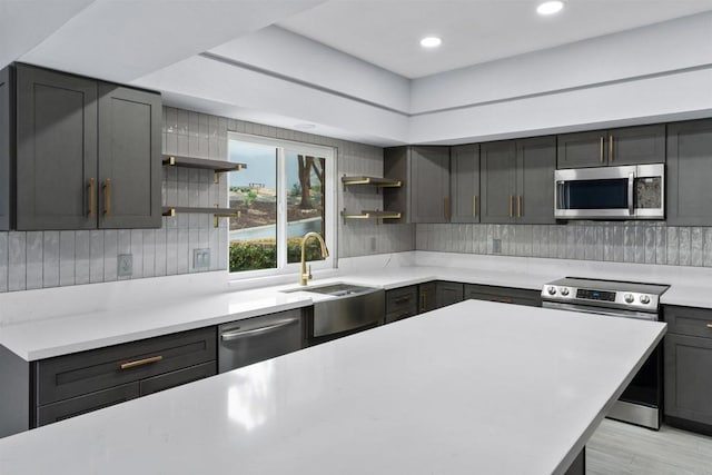 32404 Womsi Rd, Pauma Valley, CA 92061 - kitchen featuring appliances with stainless steel finishes, open shelves, light countertops, tasteful backsplash, and recessed lighting
