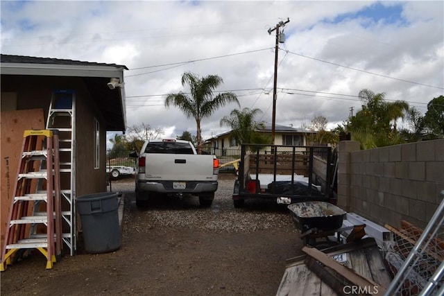 exterior space featuring a gate and fence