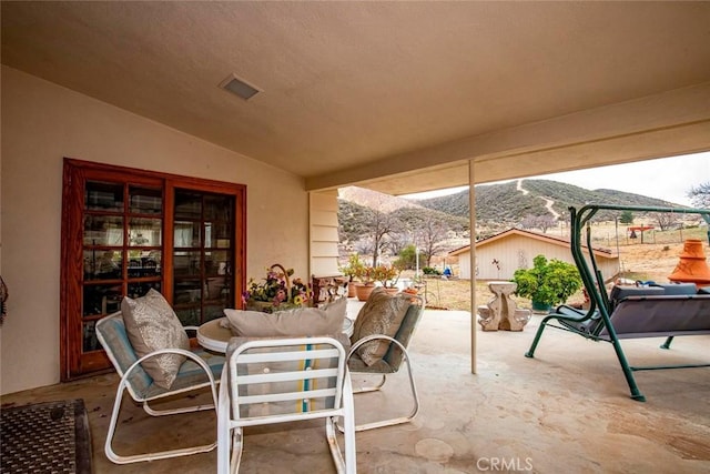 view of patio featuring a mountain view