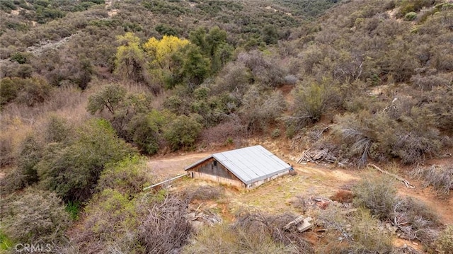 bird's eye view featuring a view of trees